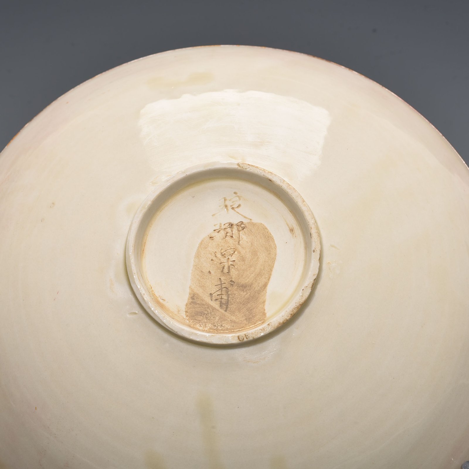 Song Dynasty Ding kiln carved flower and dragon pattern plate