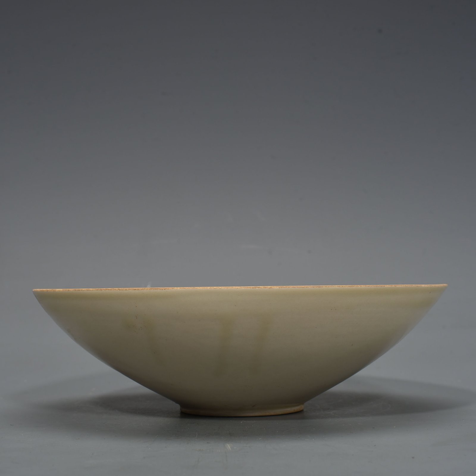 Song Dynasty Ding Kiln carved flower and bird pattern bowl