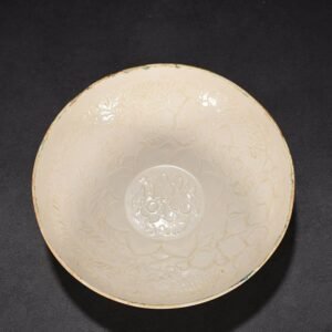 Song Dynasty Ding kiln carved fish and algae pattern bowl