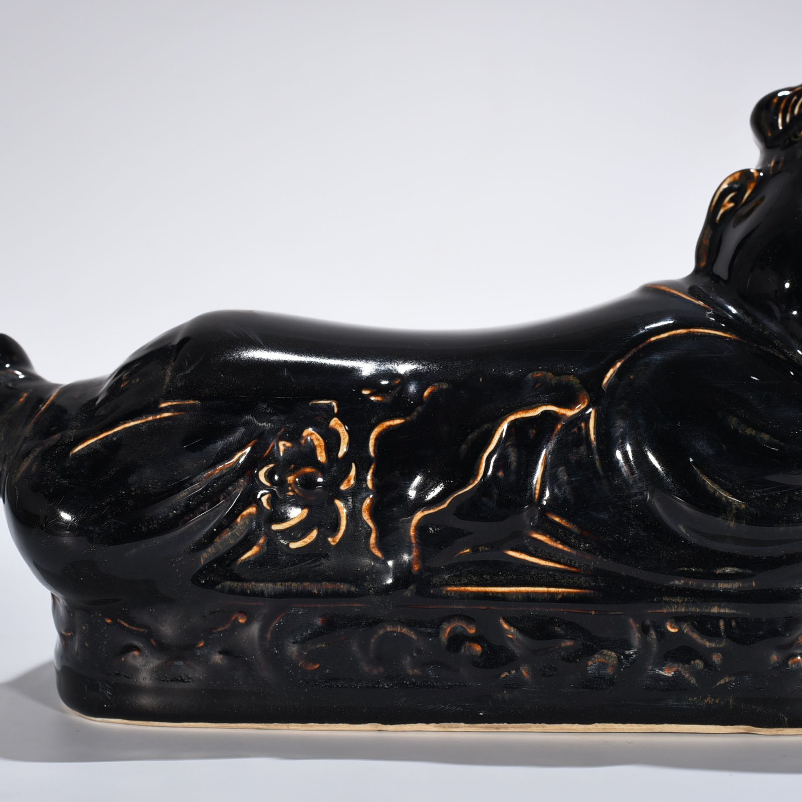 Song Dynasty Ding Kiln three-year black glaze doll pillow