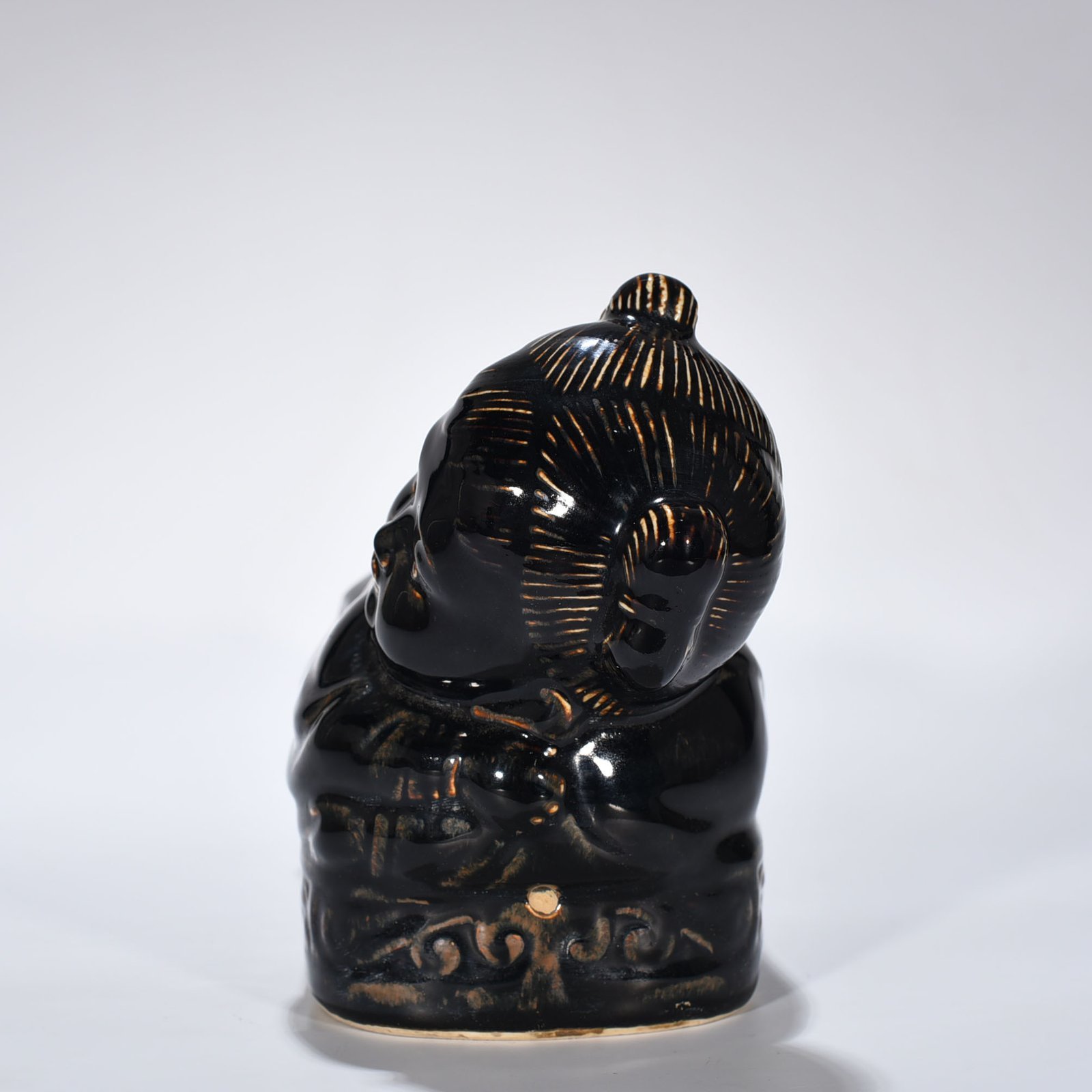 Song Dynasty Ding Kiln three-year black glaze doll pillow