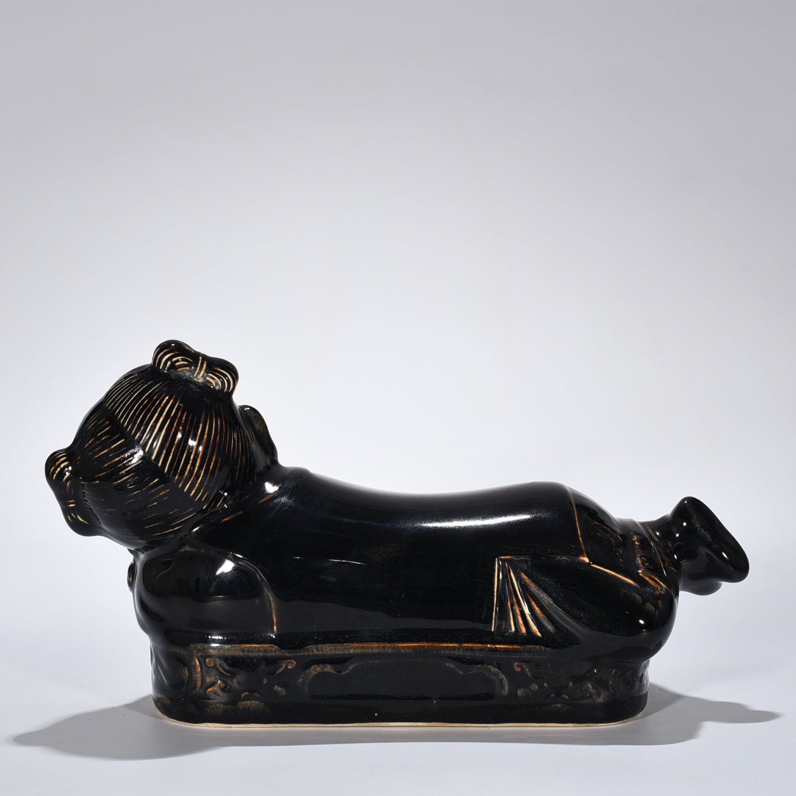Song Dynasty Ding Kiln three-year black glaze doll pillow