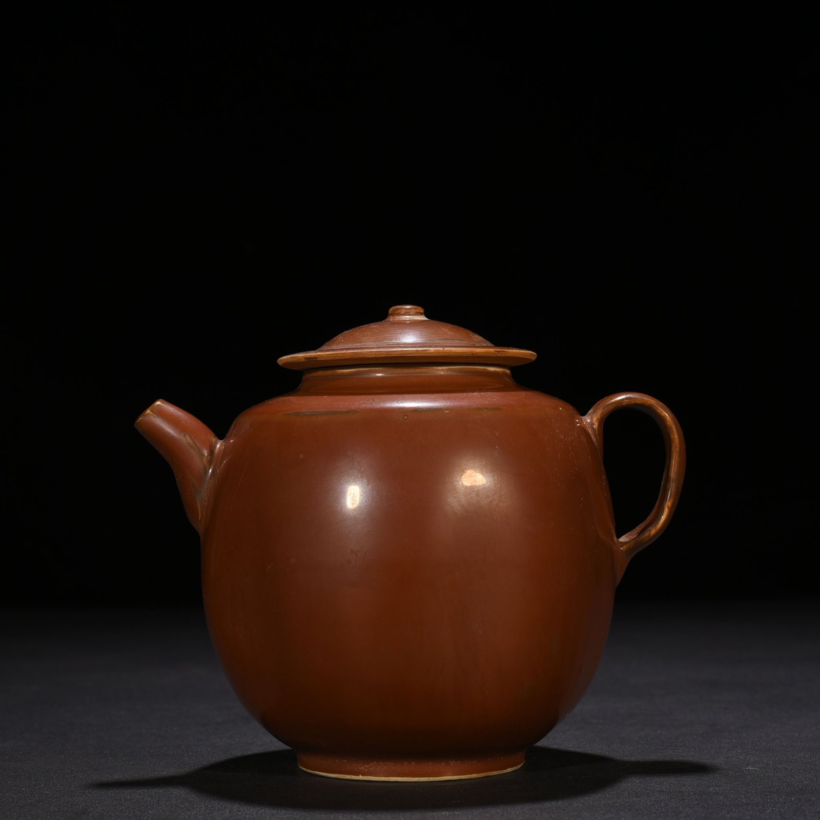 Song Dynasty Ding kiln purple Ding handle pot