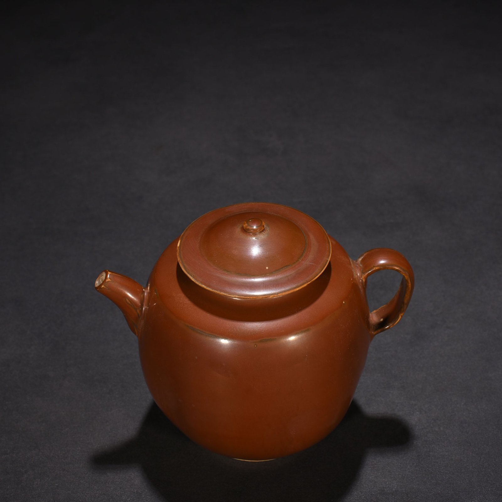 Song Dynasty Ding kiln purple Ding handle pot