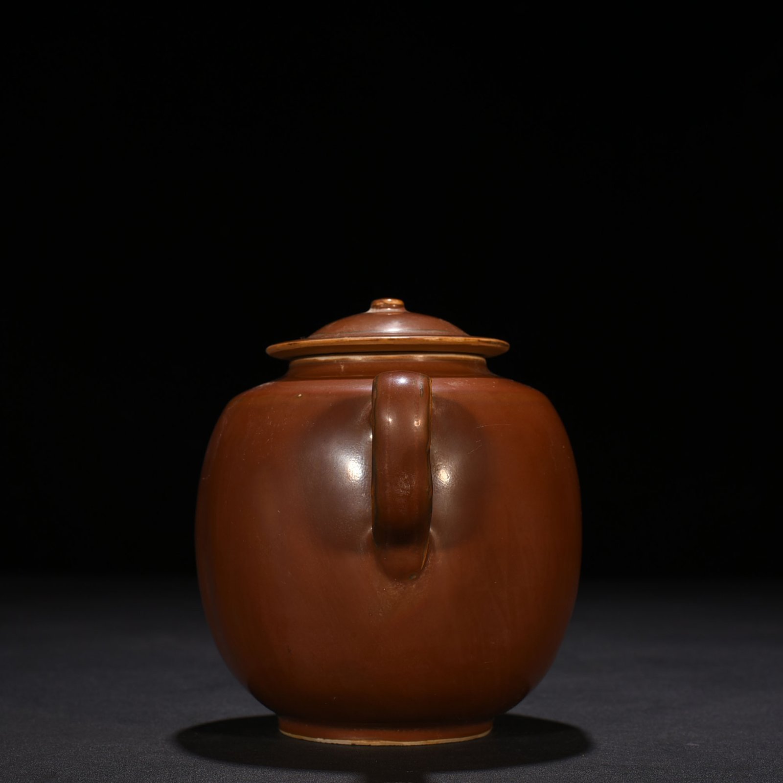 Song Dynasty Ding kiln purple Ding handle pot