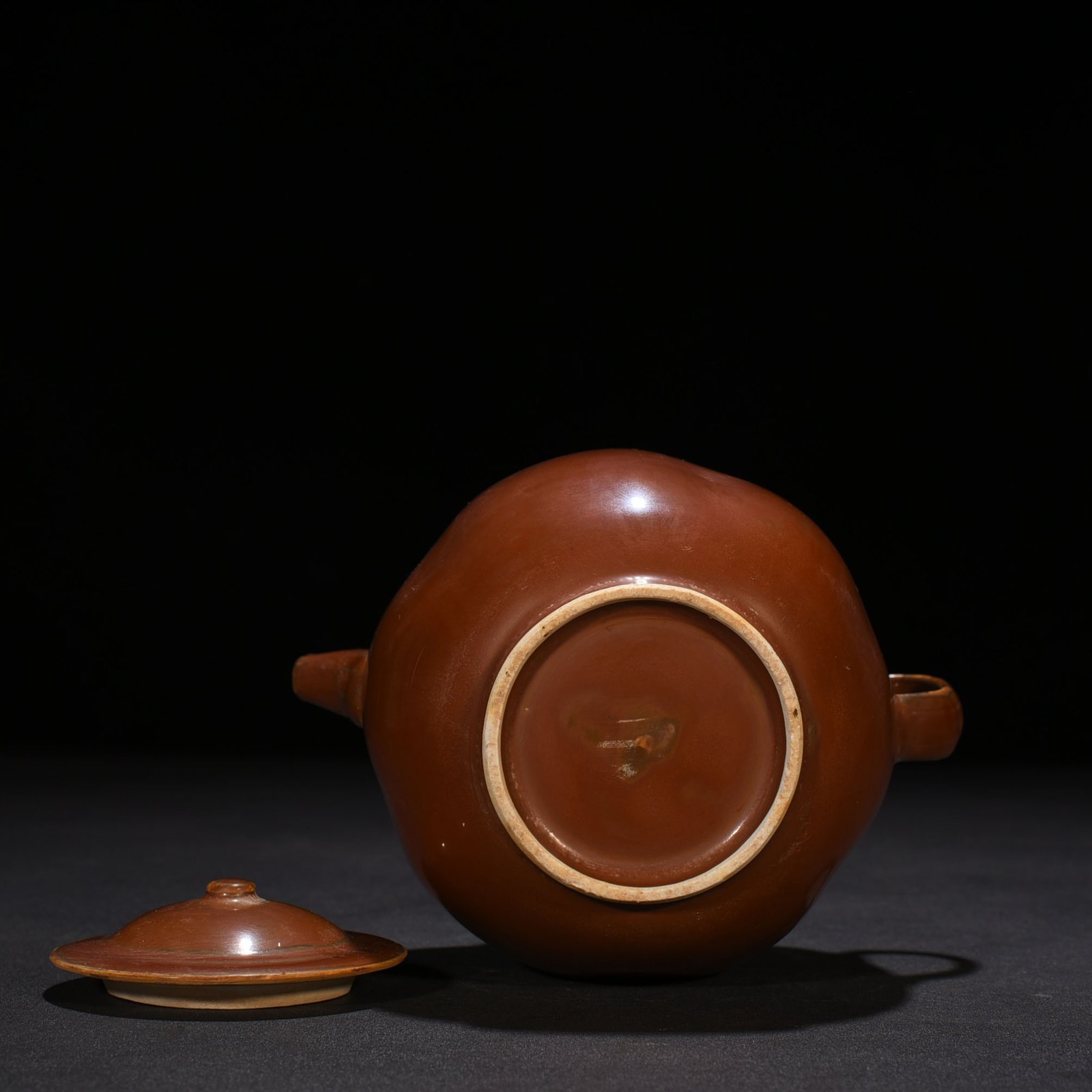 Song Dynasty Ding kiln purple Ding handle pot