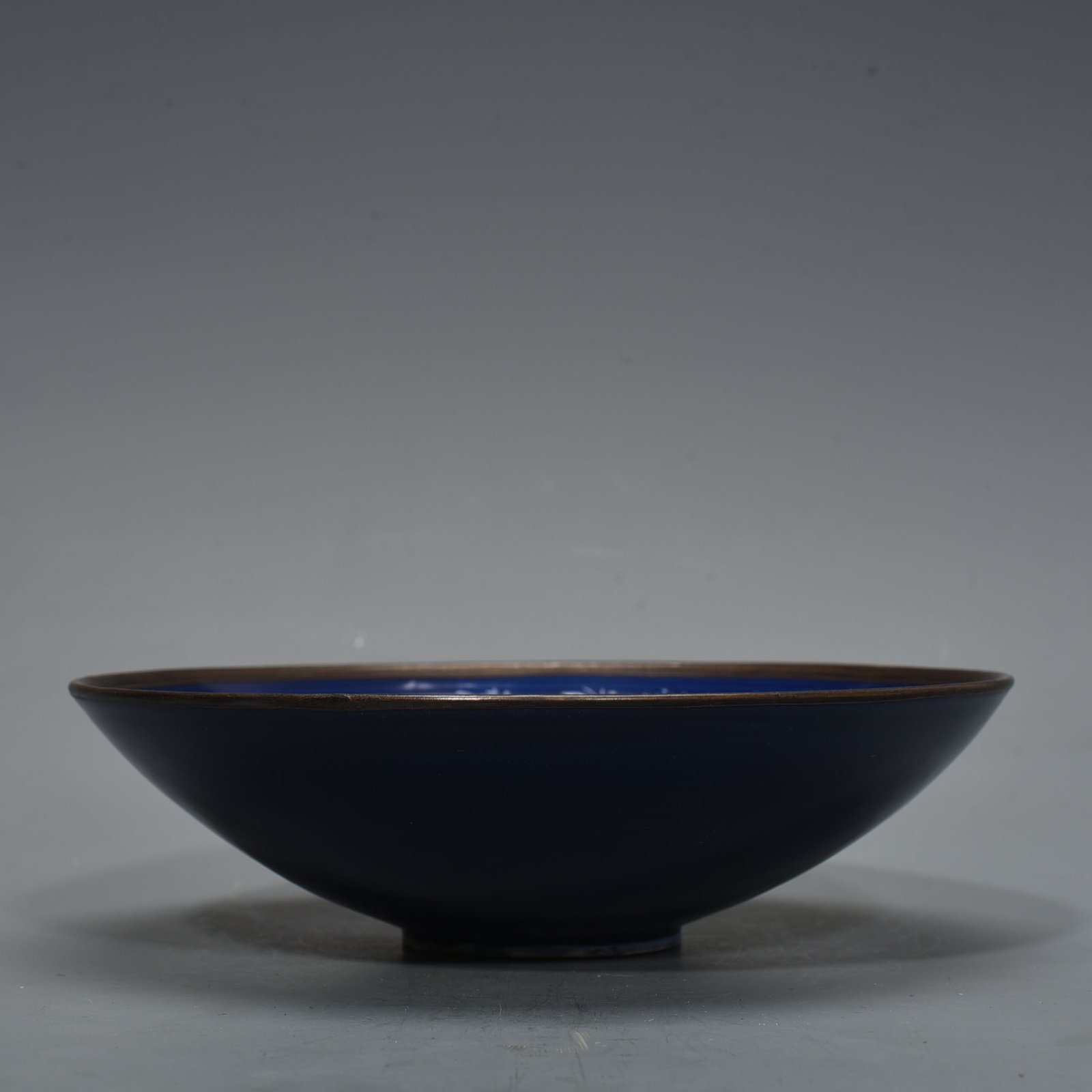Song Dynasty Ding Kiln blue glaze bowl with dragon pattern