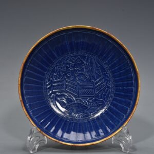 Song Dynasty Ding Kiln blue glaze engraved lotus pond and mandarin duck pattern plate inlaid with copper buckle