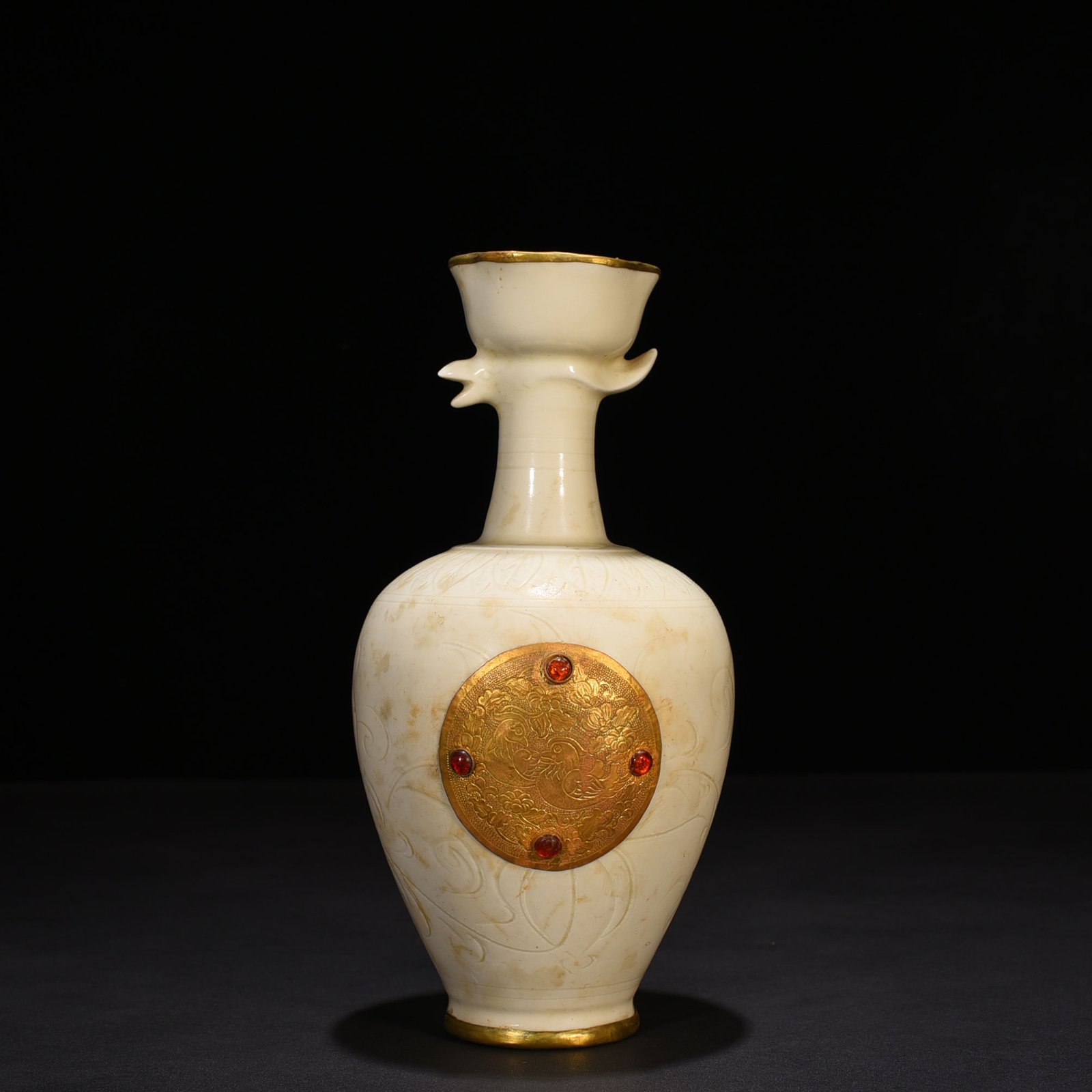 Song Dynasty Ding kiln gold and gem inlaid phoenix head pot
