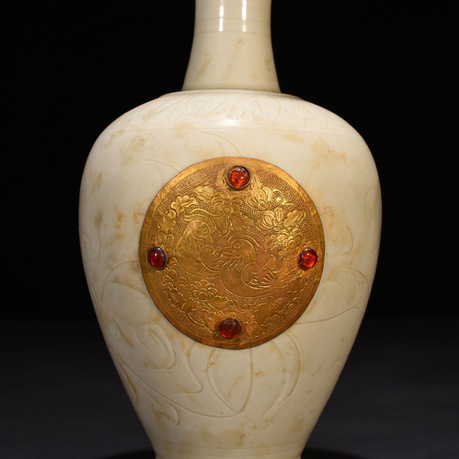 Song Dynasty Ding kiln gold and gem inlaid phoenix head pot