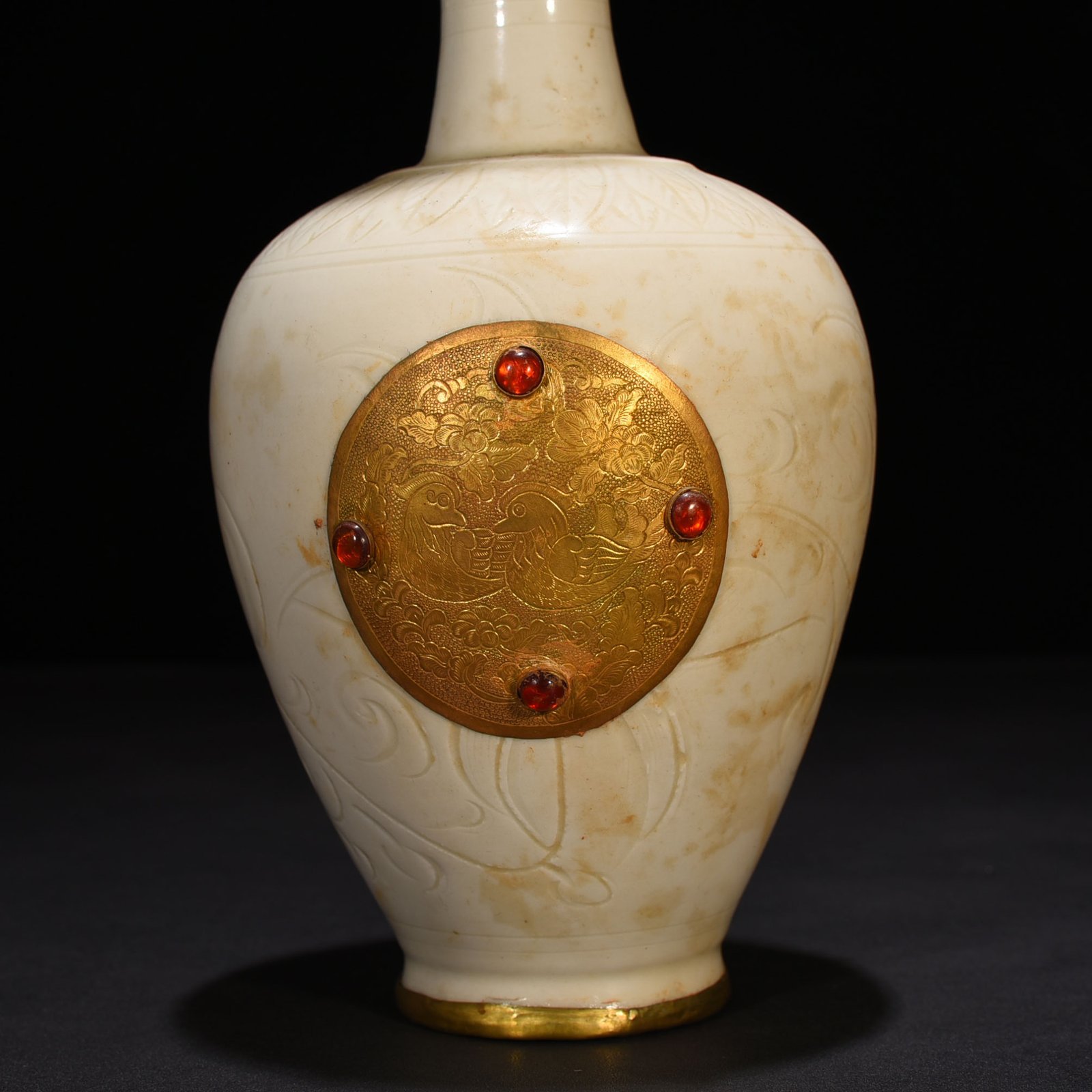 Song Dynasty Ding kiln gold and gem inlaid phoenix head pot