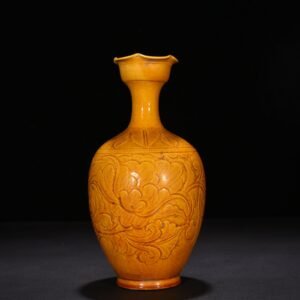 Song Dynasty Ding kiln yellow glaze official style engraved flower mouth vase