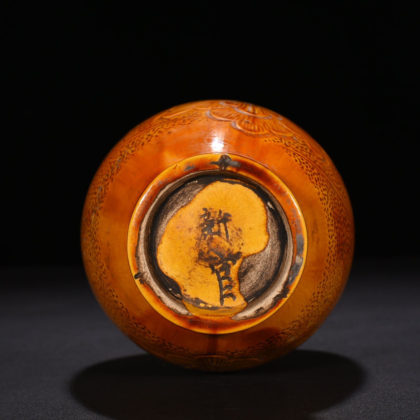Song Dynasty Ding kiln yellow glaze engraved flower pattern vase