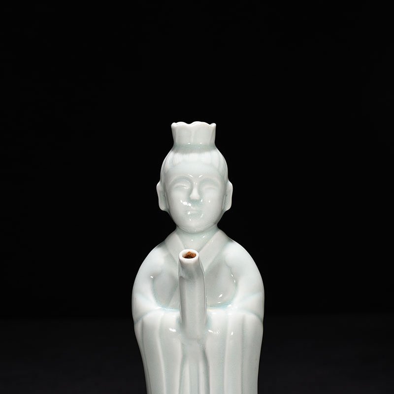 Song Dynasty Hutian kiln shadow celadon pot with boy chanting and holding pot