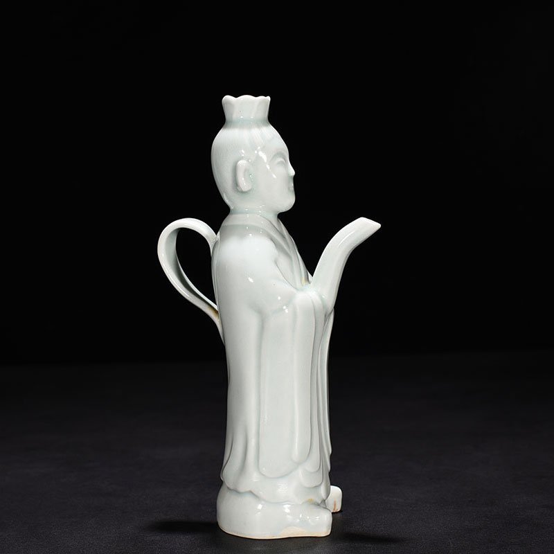 Song Dynasty Hutian kiln shadow celadon pot with boy chanting and holding pot