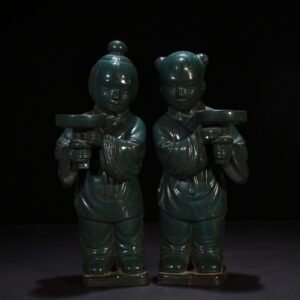 Song Dynasty green glaze golden boy and jade girl candlestick