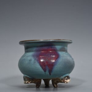 Song Dynasty Jun kiln blue glaze red spot three-legged furnace