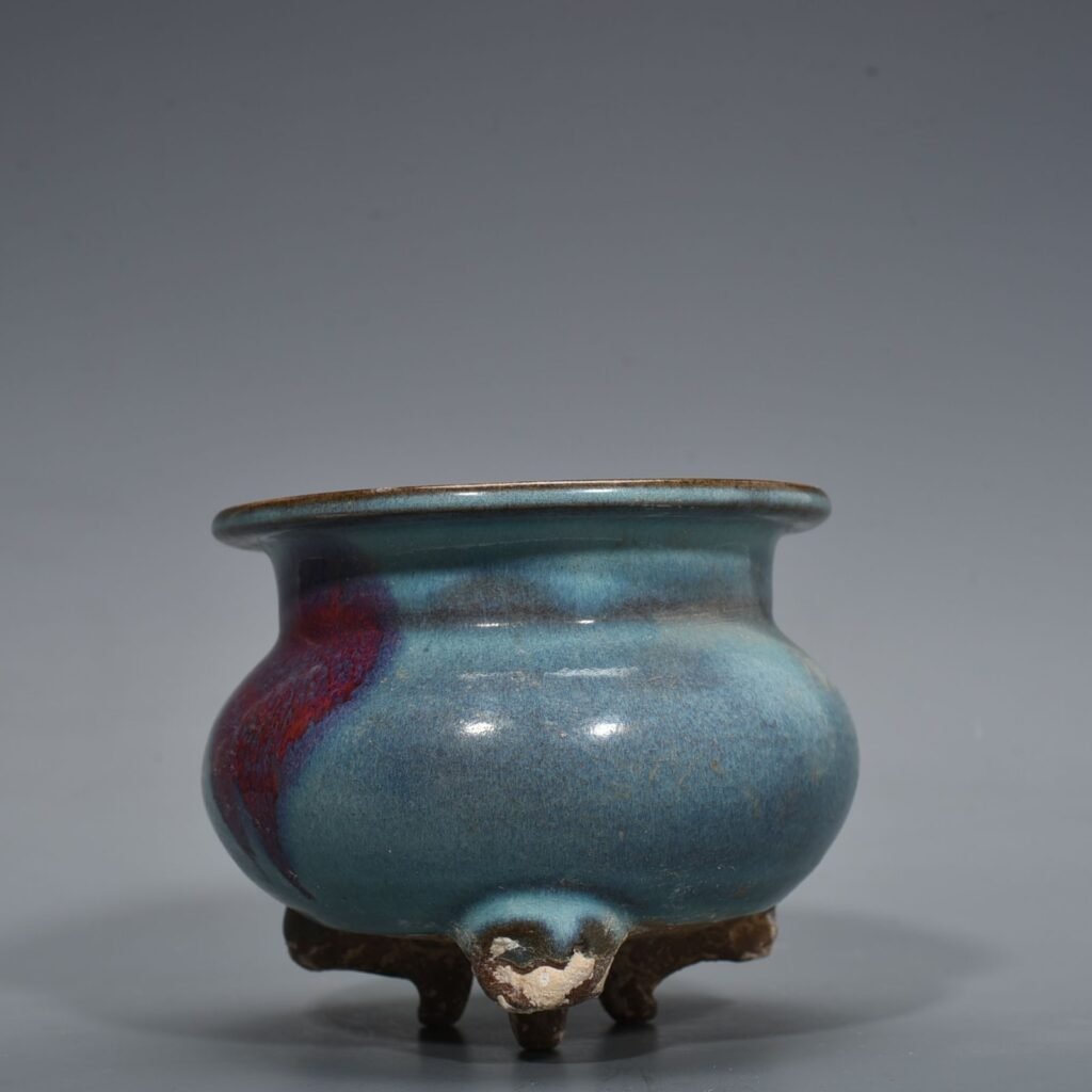 Song Dynasty Jun kiln blue glaze red spot three-legged furnace