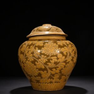 Song Dynasty yellow-glazed Cizhou kiln carved lid jar with entangled branches and floral patterns