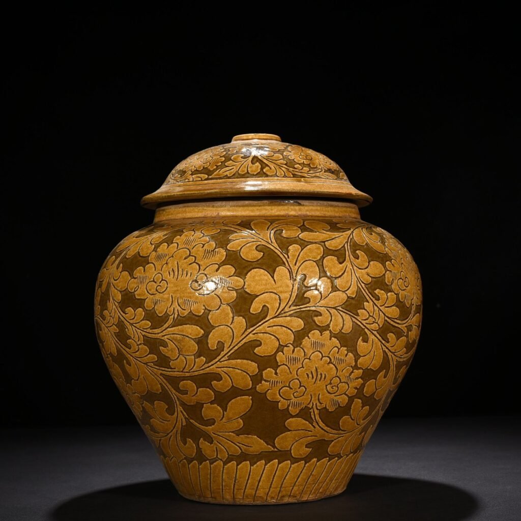 Song Dynasty yellow-glazed Cizhou kiln carved lid jar with entangled branches and floral patterns