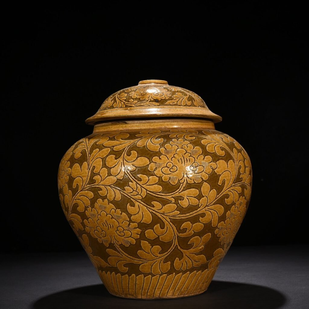 Song Dynasty yellow-glazed Cizhou kiln carved lid jar with entangled branches and floral patterns