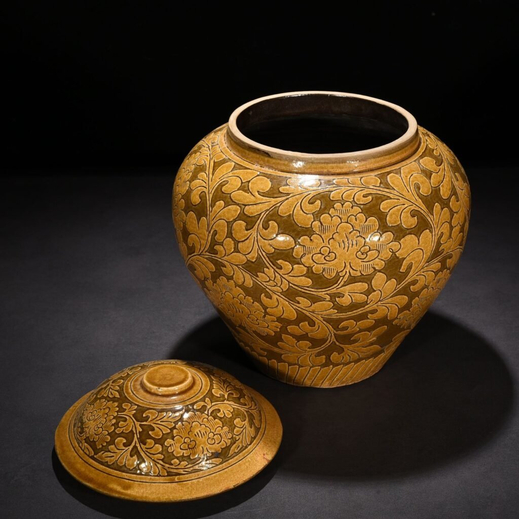 Song Dynasty yellow-glazed Cizhou kiln carved lid jar with entangled branches and floral patterns