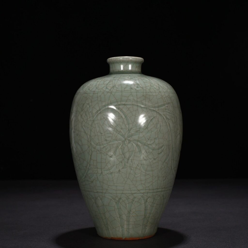 Song Dynasty Longquan kiln carved plum vase with entwining lotus pattern