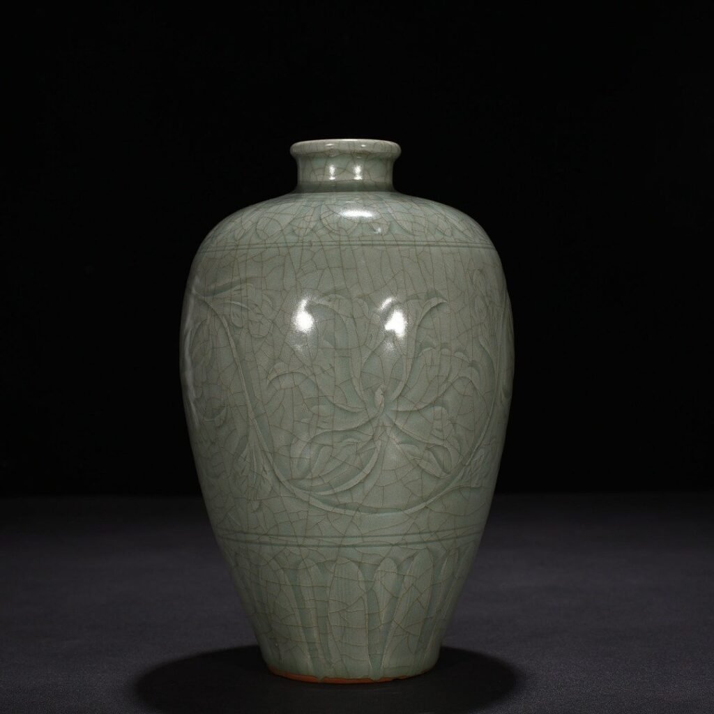 Song Dynasty Longquan kiln carved plum vase with entwining lotus pattern