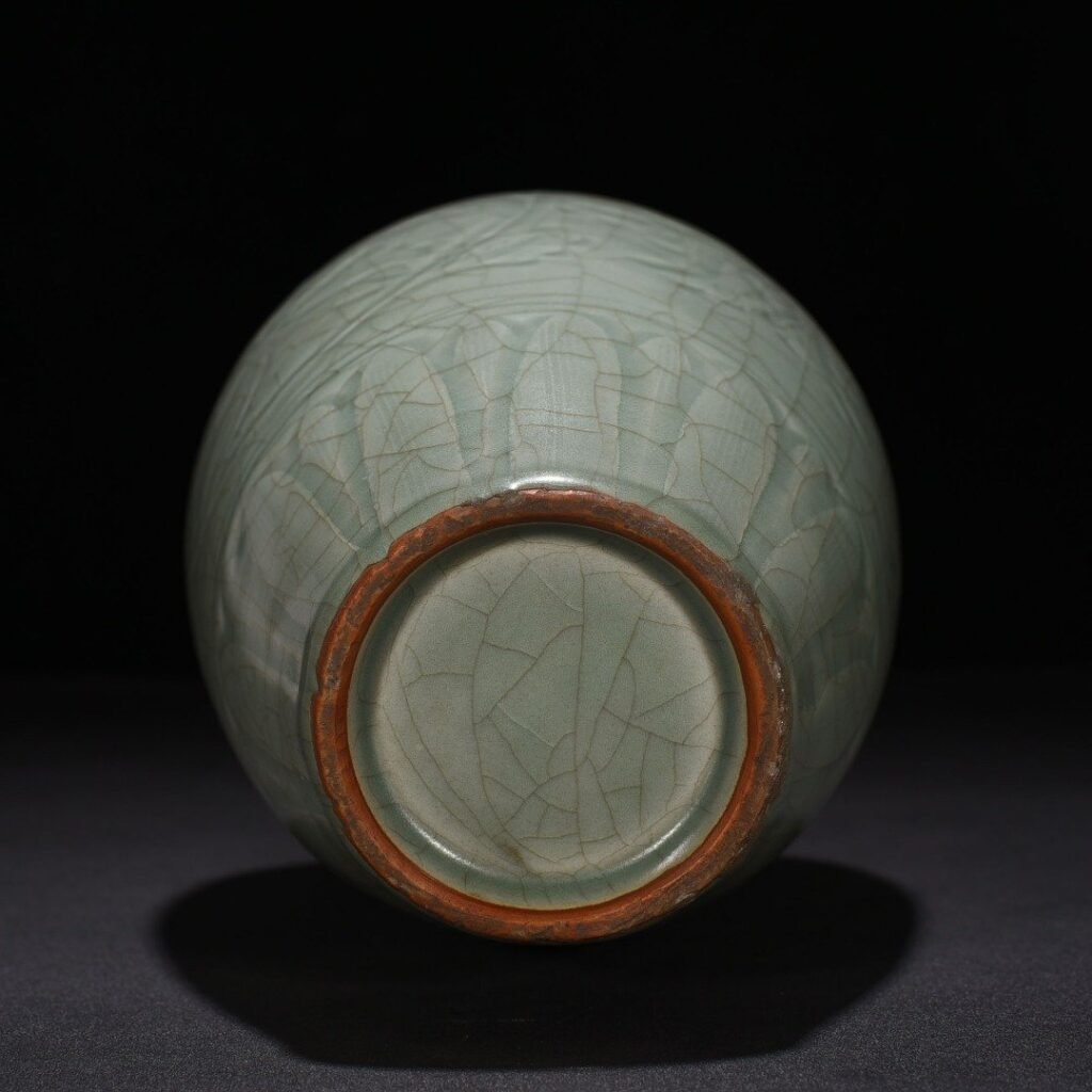 Song Dynasty Longquan kiln carved plum vase with entwining lotus pattern