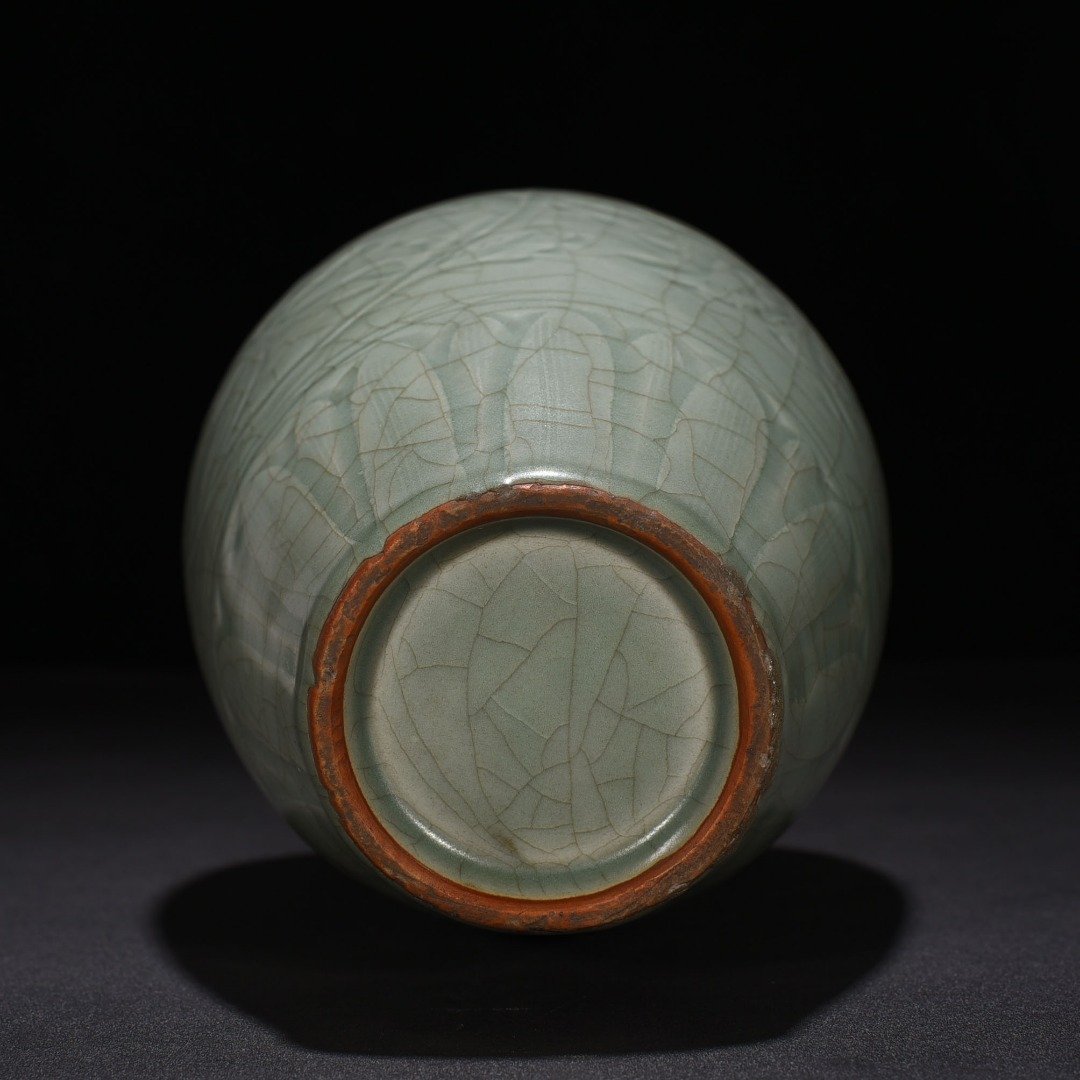 Song Dynasty Longquan kiln carved plum vase with entwining lotus pattern
