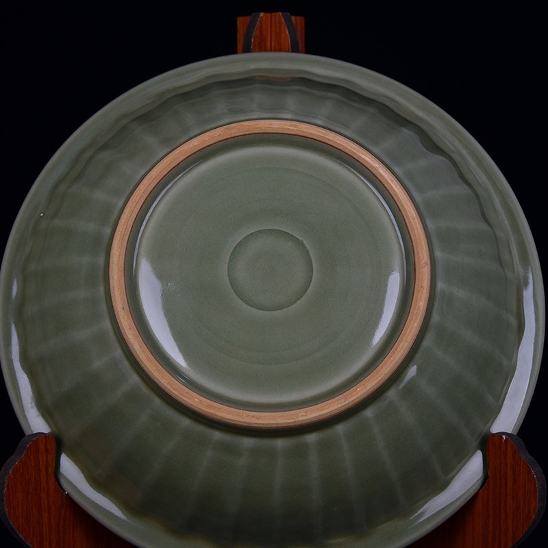 Song Dynasty Longquan kiln plum green glaze engraved peony pattern folded edge dish