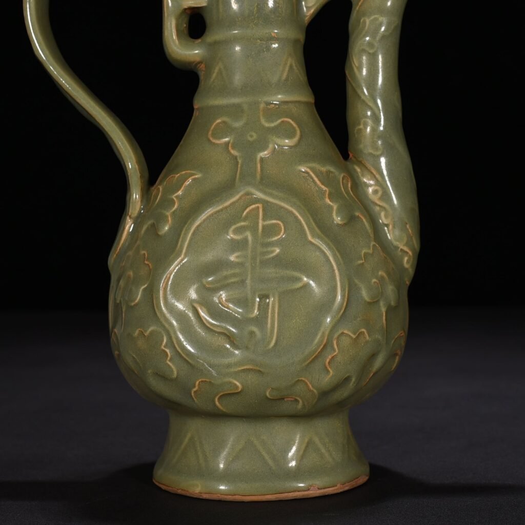 Song Dynasty Longquan kiln plum green glaze Fushou ewer