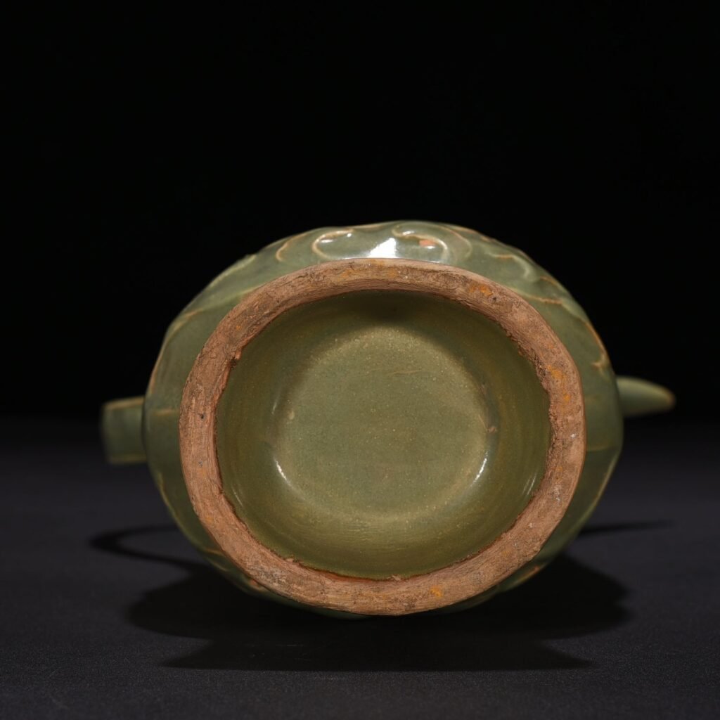 Song Dynasty Longquan kiln plum green glaze Fushou ewer