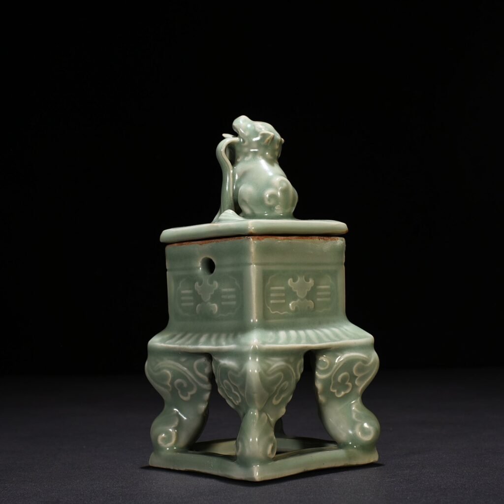 Song Dynasty Longquan kiln plum celadon carved eight trigrams hollow square smoker