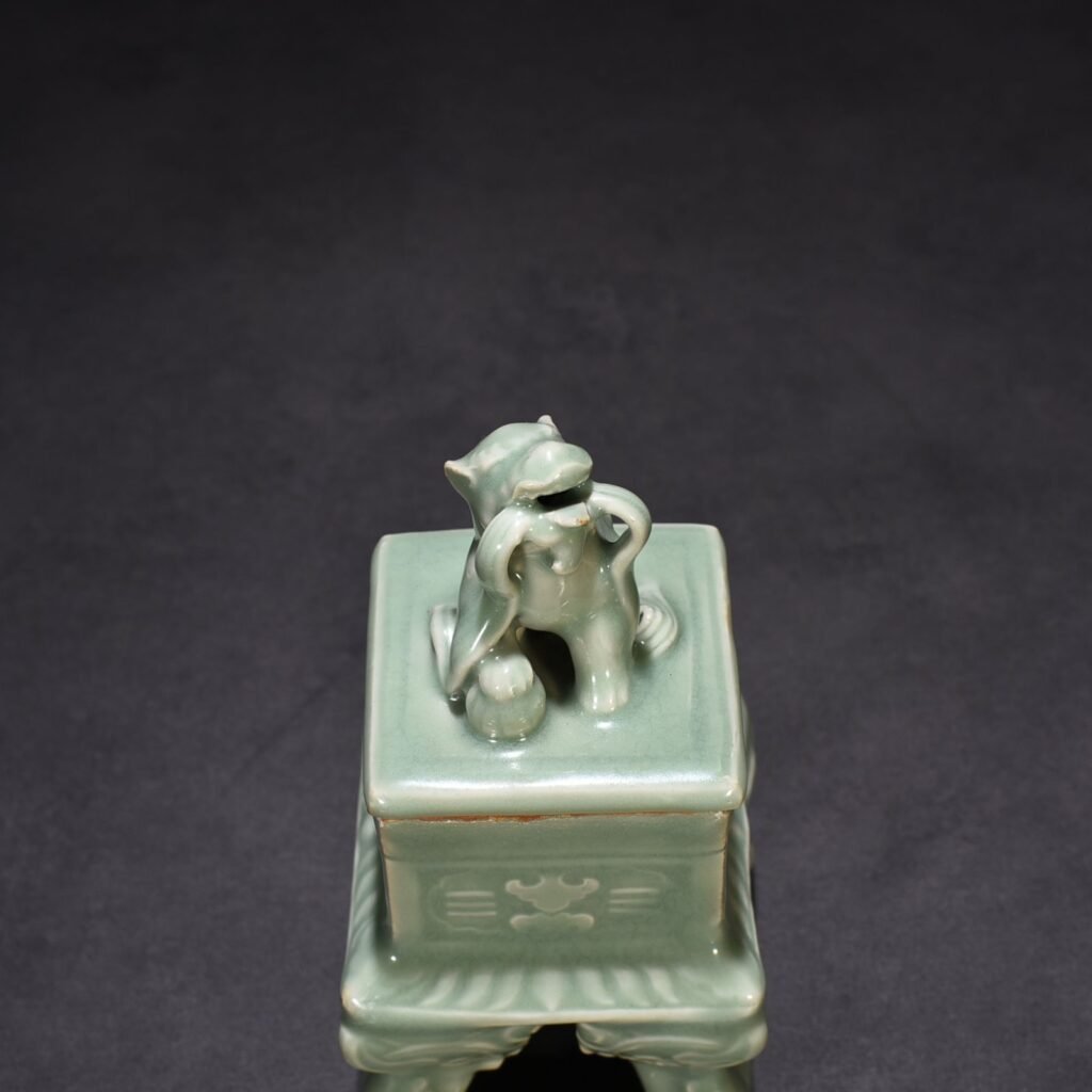 Song Dynasty Longquan kiln plum celadon carved eight trigrams hollow square smoker