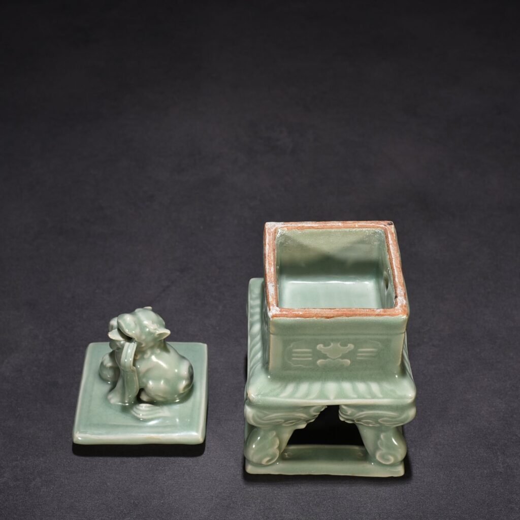 Song Dynasty Longquan kiln plum celadon carved eight trigrams hollow square smoker