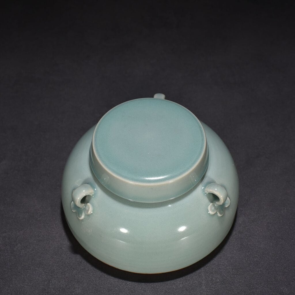 Song Dynasty Longquan kiln pink celadon glaze three-series covered jar