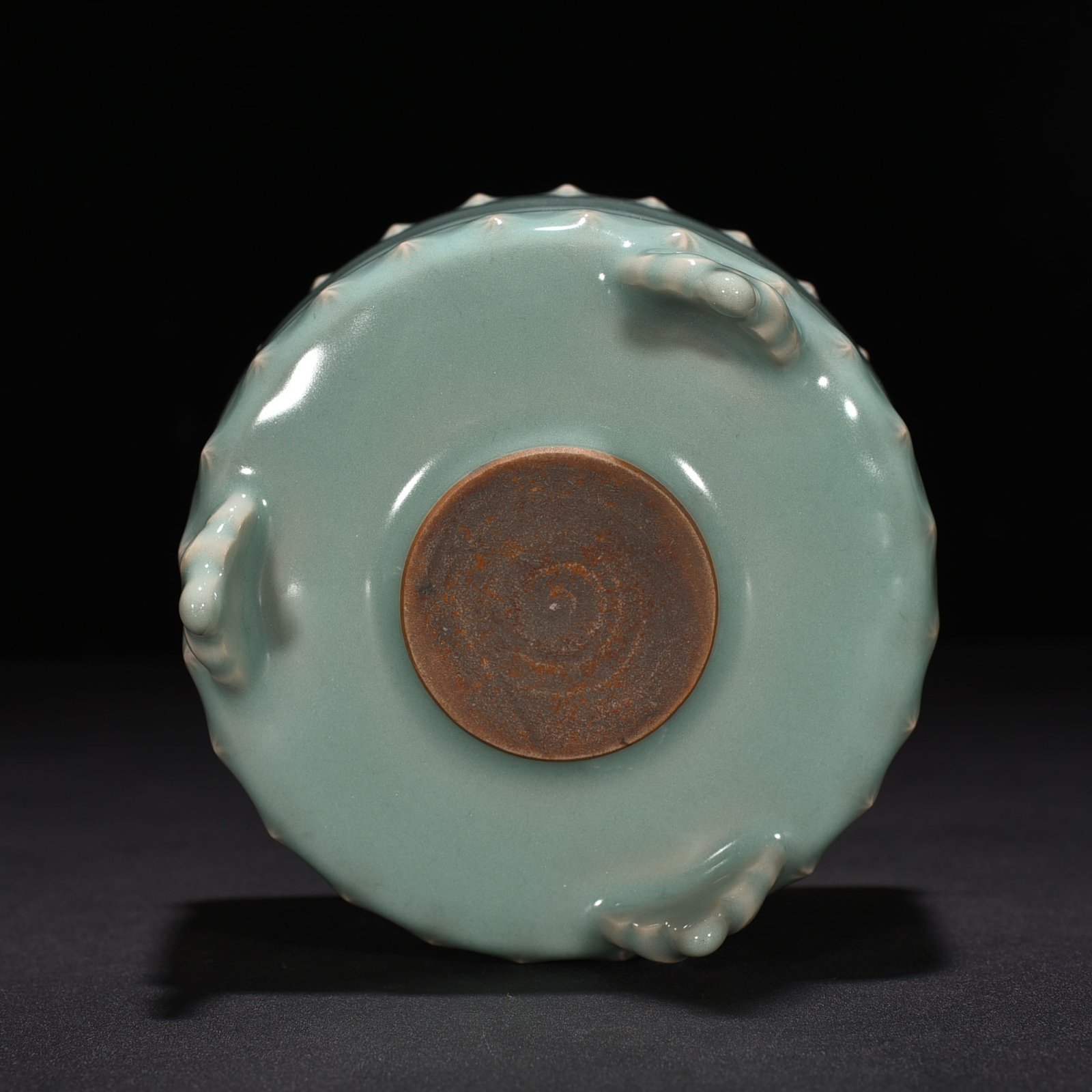 Song Dynasty Longquan kiln pink green glaze three-legged drum nail furnace