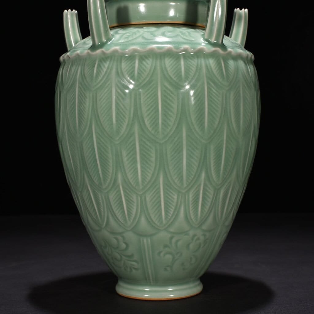 Song Dynasty Longquan kiln pink green glaze five-tube vase with banana leaf pattern