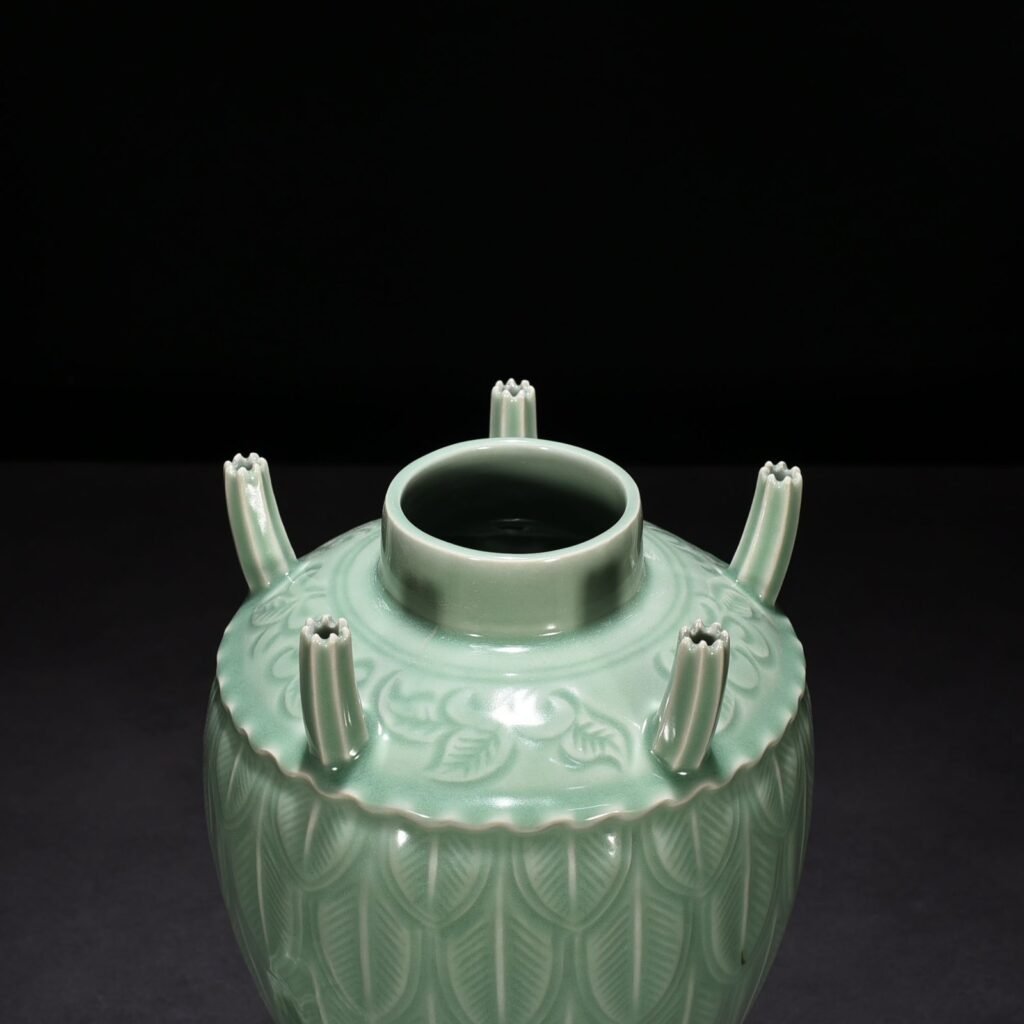 Song Dynasty Longquan kiln pink green glaze five-tube vase with banana leaf pattern