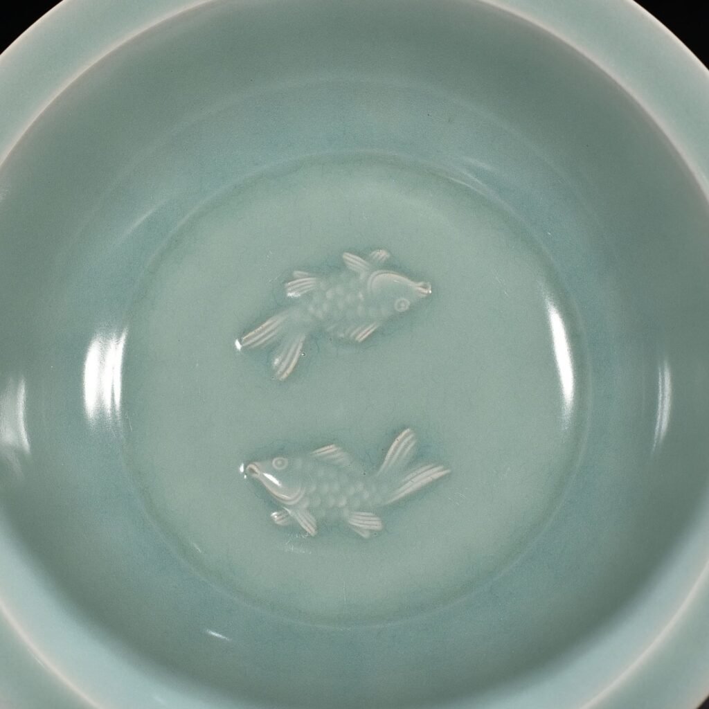 Song Dynasty Longquan kiln pink celadon glaze double fish folding rim bowl
