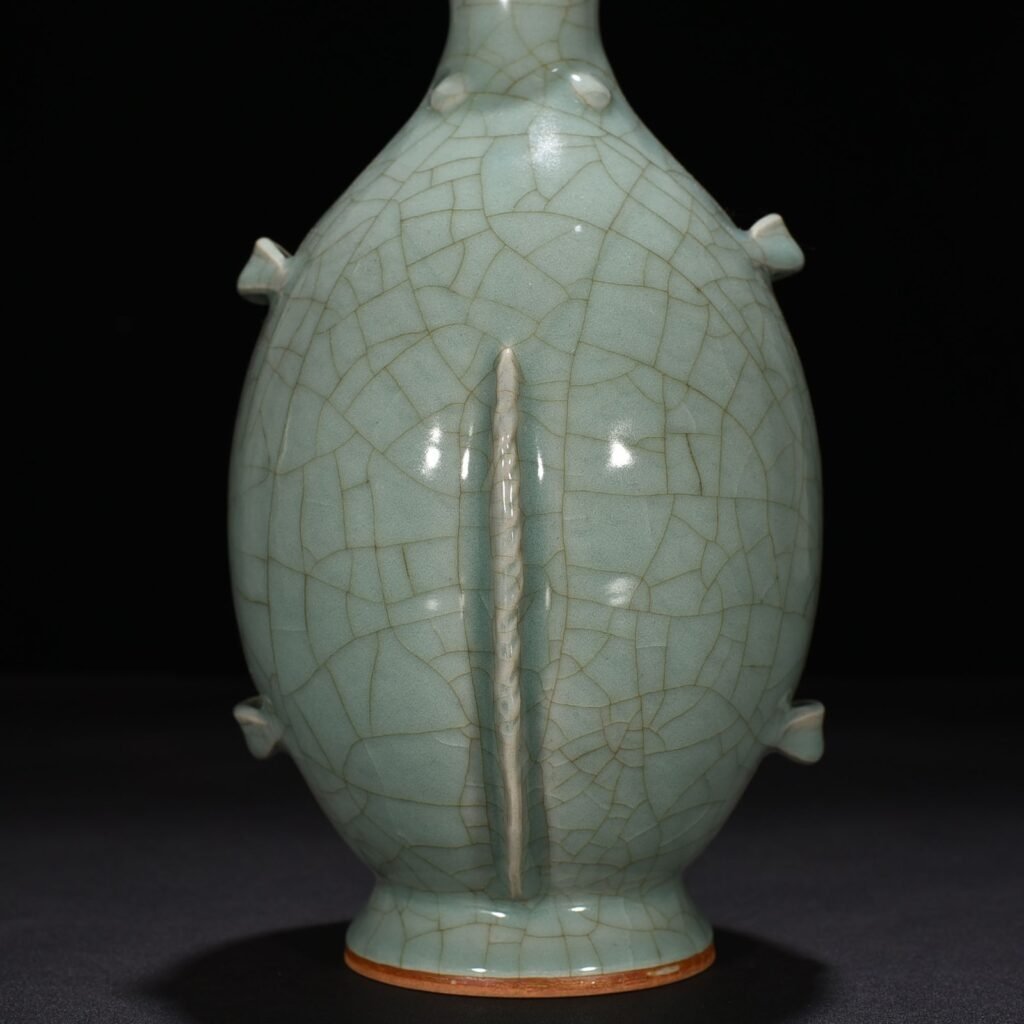 Song Dynasty Longquan kiln pink celadon glaze double fish vase