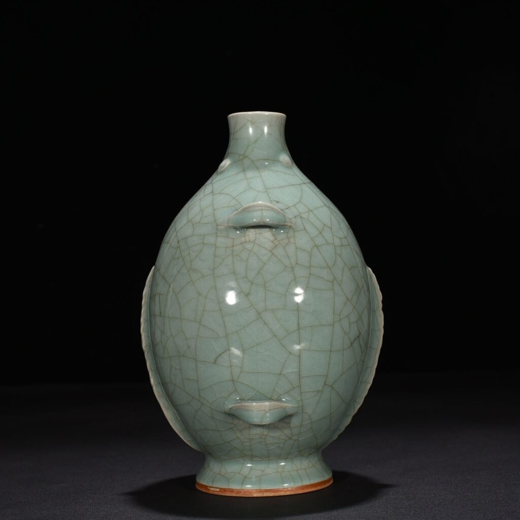 Song Dynasty Longquan kiln pink celadon glaze double fish vase