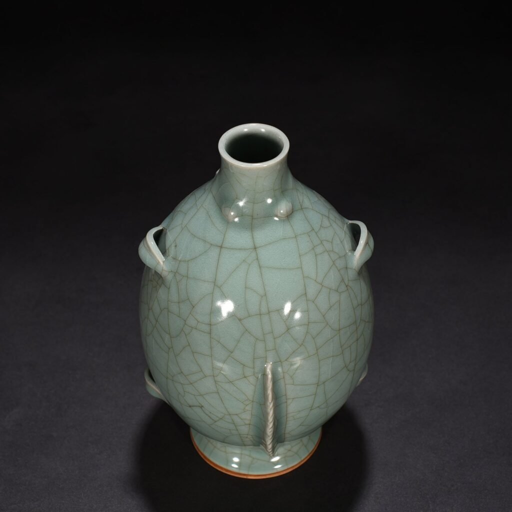 Song Dynasty Longquan kiln pink celadon glaze double fish vase