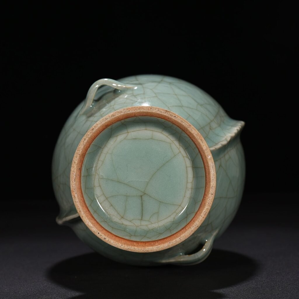Song Dynasty Longquan kiln pink celadon glaze double fish vase