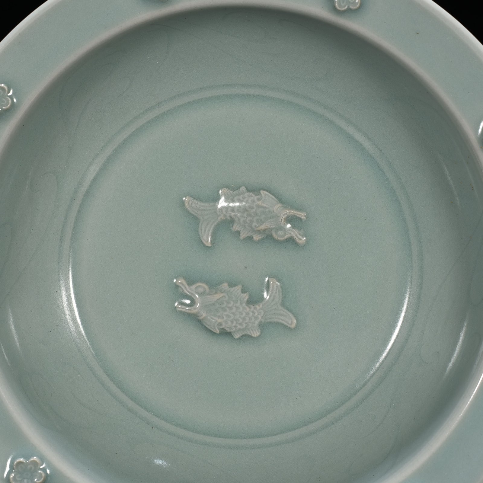 Song Dynasty Longquan kiln pink celadon glaze double fish pattern folded edge plate