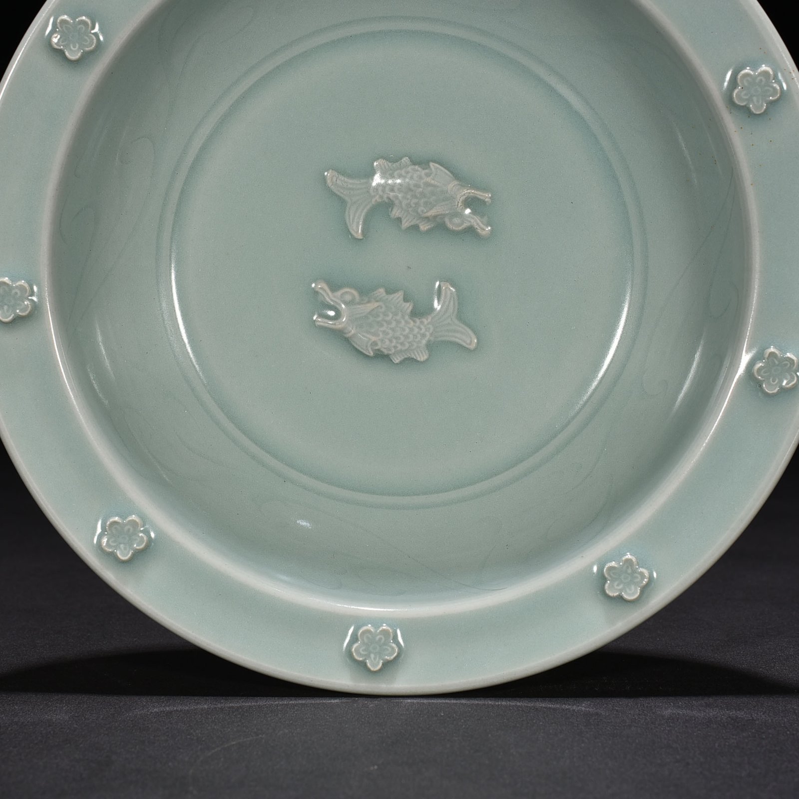 Song Dynasty Longquan kiln pink celadon glaze double fish pattern folded edge plate