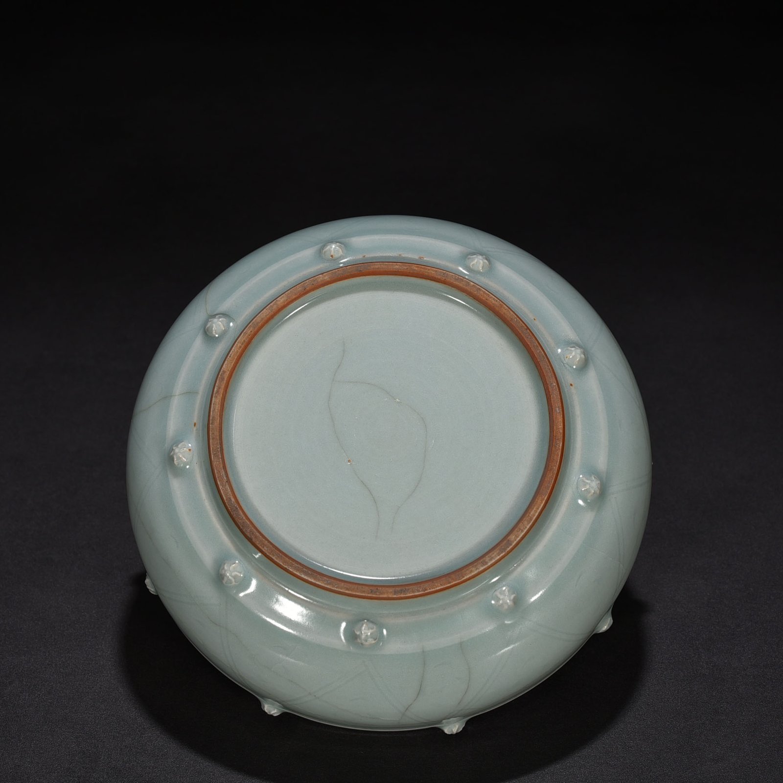 Song Dynasty Longquan kiln pink celadon glaze stacked dragon pattern drum nail wash