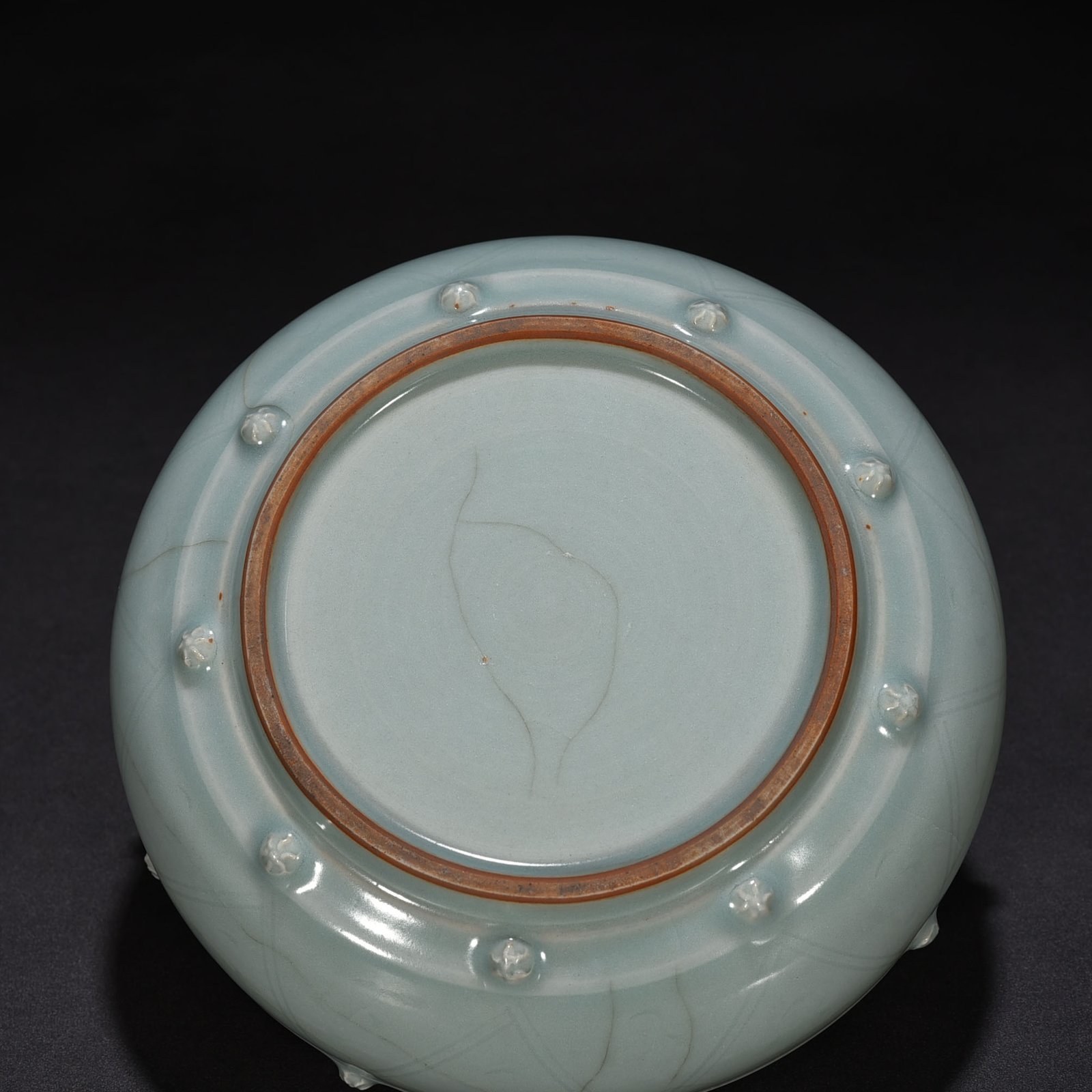 Song Dynasty Longquan kiln pink celadon glaze stacked dragon pattern drum nail wash