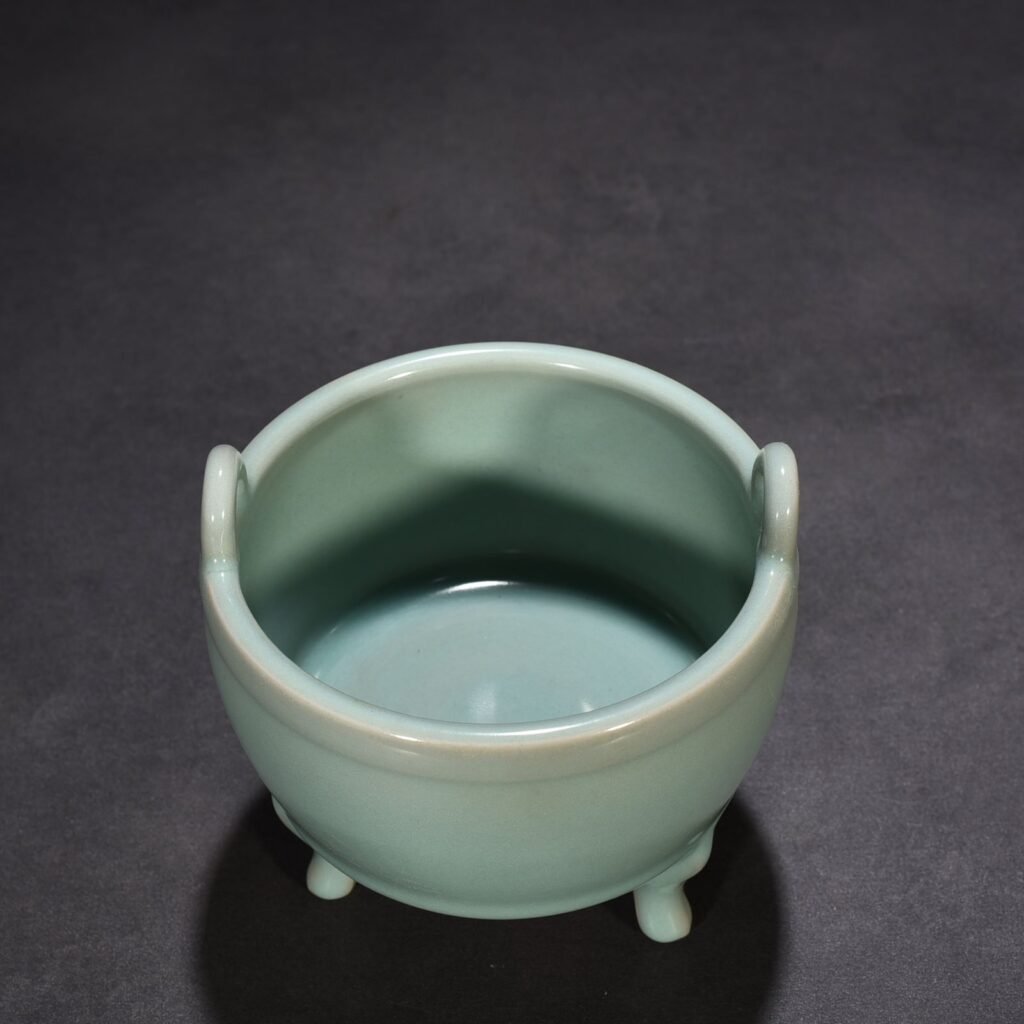 Song Dynasty Longquan kiln pink green glaze bridge ear stove